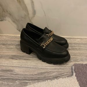 Chunky black platform loafers